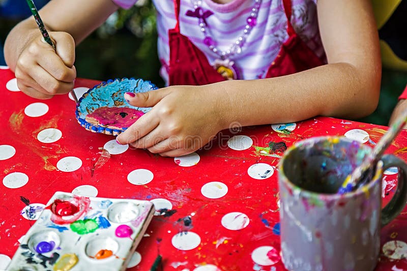 Children painting pottery 13 stock image Children painting pottery 13 stock image