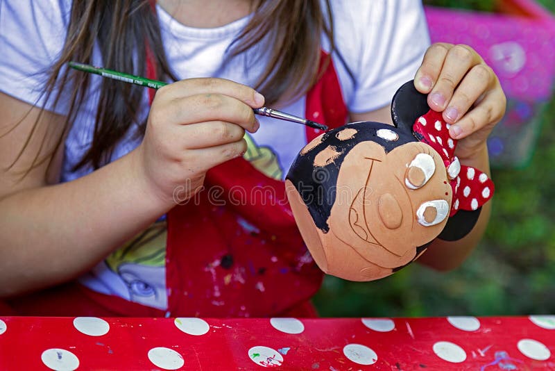 Children painting pottery 16 stock image Children painting pottery 16 stock image