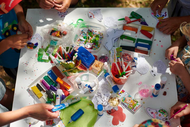 Children Paper Crafting with Parents in Outdoor Children Party ...