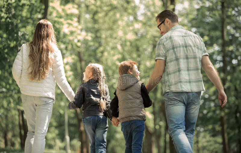 Children and parents on a walk in the Park.t royalty free stock images Children and parents on a walk in the Park.t royalty free stock images