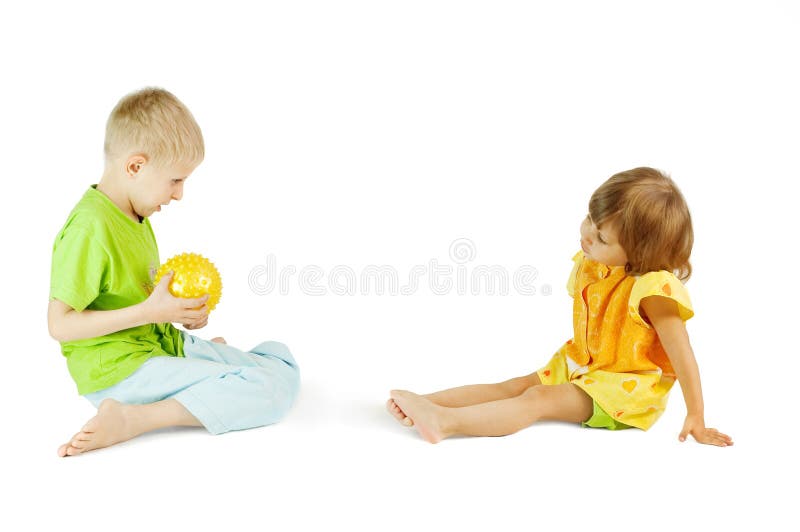 Children play with a ball stock photo