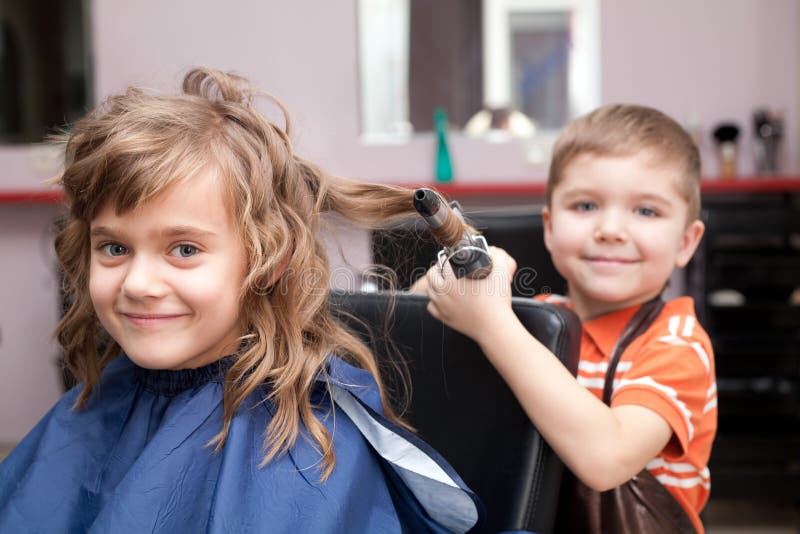 Children play in the barbershop