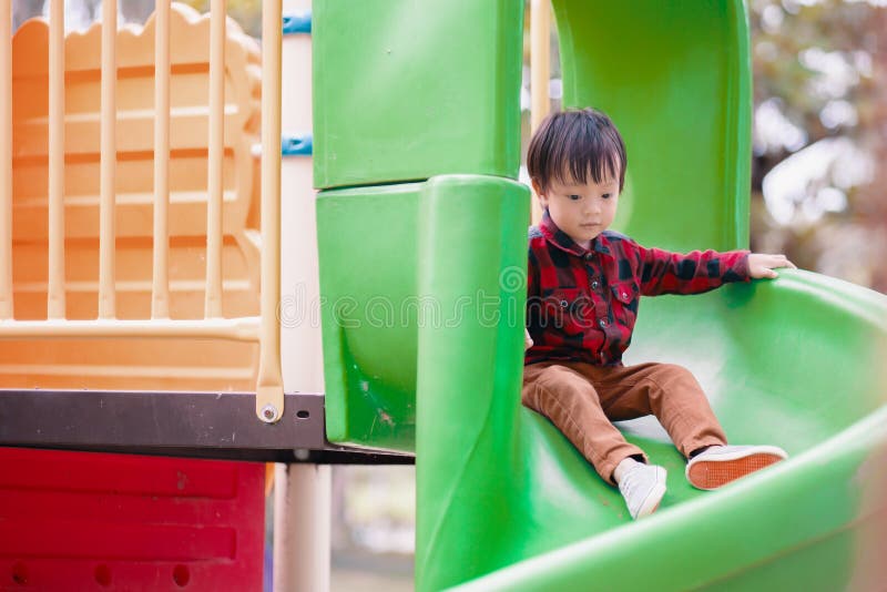 Children Play Slide Playground in the Park Stock Image Image of
