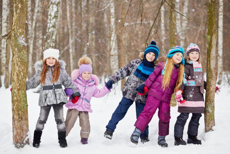 Children play in winter park