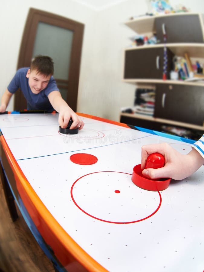 Air Hockey Game stock image. Image of competition, compete 17073097