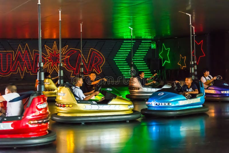 BANGKOK, THAILAND - 5 JUNE 2013: Children play bump car in Dream World amusement park on June 5, 2013. BANGKOK, THAILAND - 5 JUNE 2013: Children play bump car in Dream World amusement park on June 5, 2013.