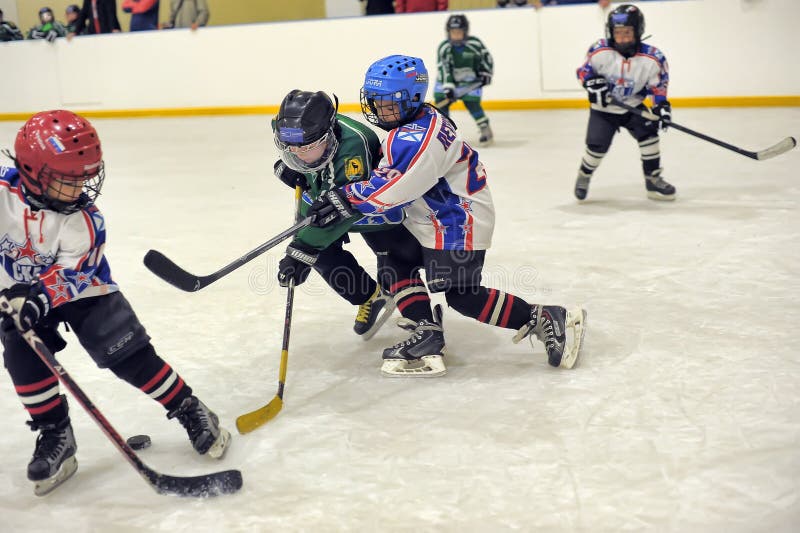 Children playing hockey