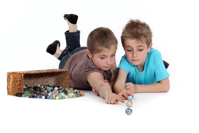 267 Children Playing Marbles Stock Photos - Free & Royalty-Free