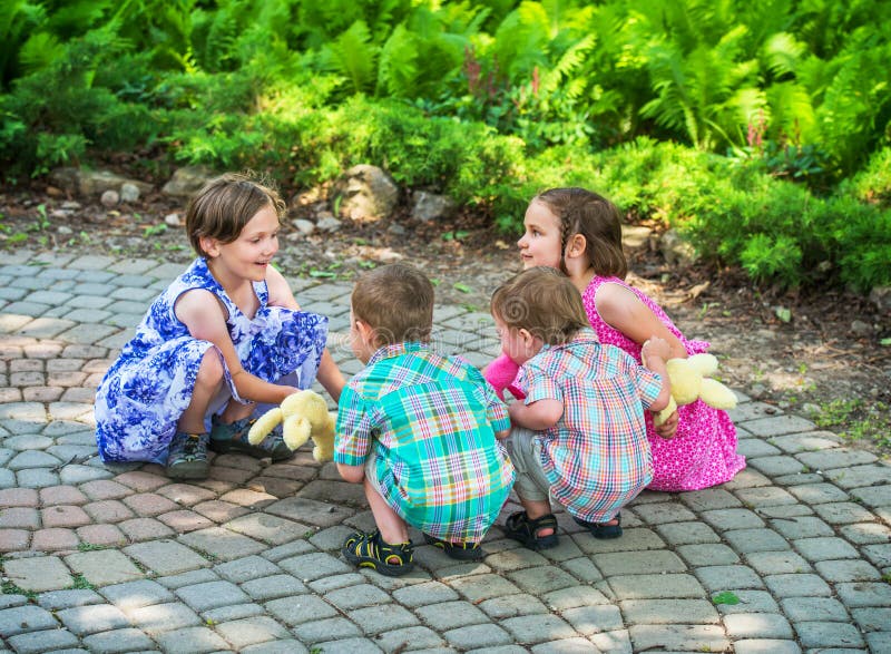 Children Playing Ring Around The Rosie Stock Photo Image Of Happy