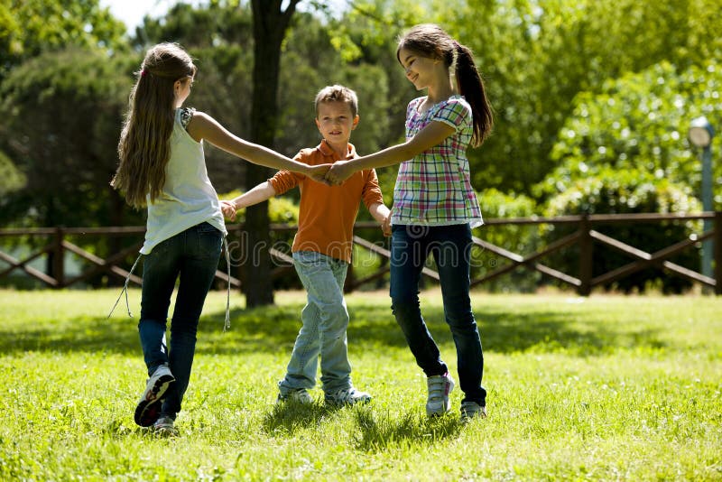 Premium Vector | Children playing ring toss scene