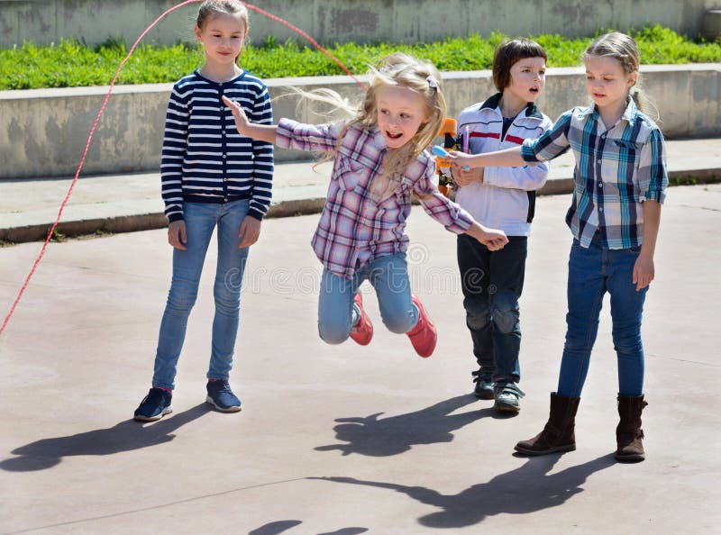 Children Playing Skipping Rope Jumping Game Stock Photo - Image: 71052540