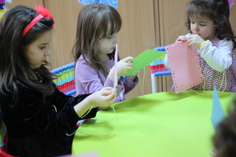 Children playing on the table