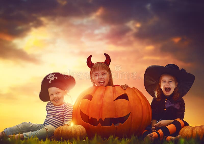 Children and pumpkins on Halloween stock photography Children and pumpkins on Halloween stock photography