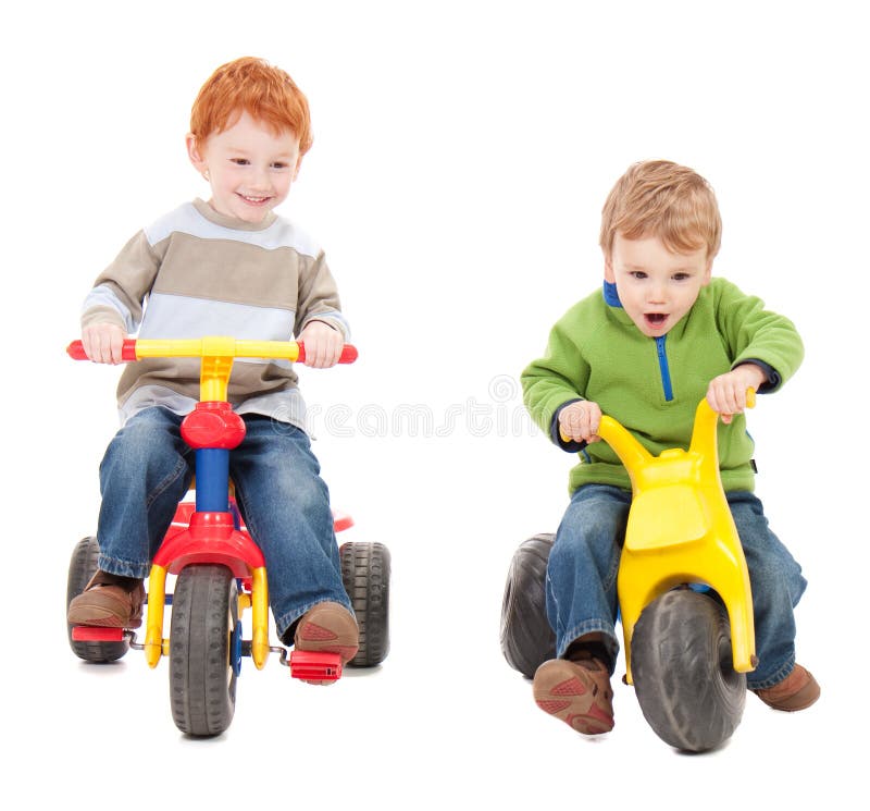 Children riding trycycles. Isolated on white. Children riding trycycles. Isolated on white.