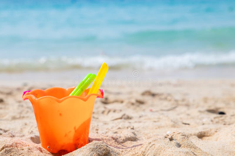 Children`s Beach Toys - Buckets, Spade and Shovel on Sand on a Sunny ...