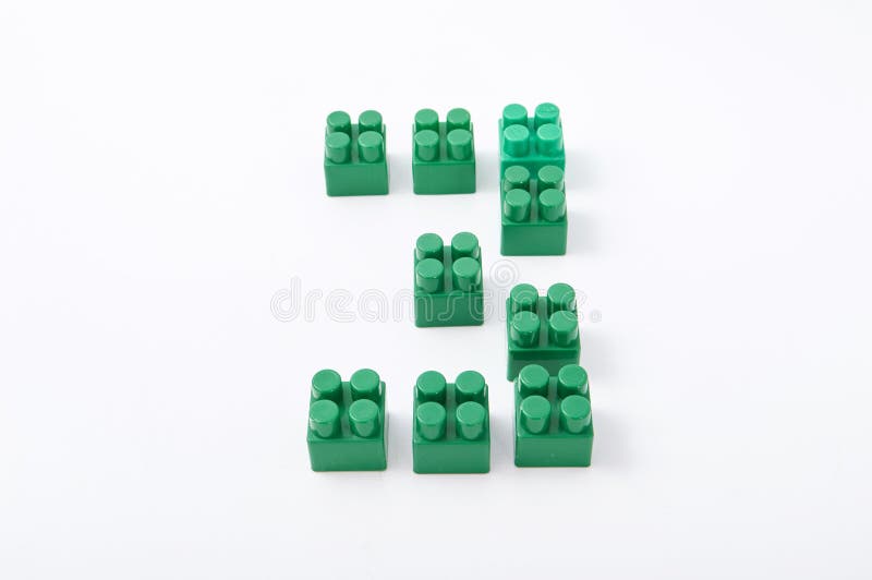 Figures from a colored cubes designer on a white background royalty free stock images