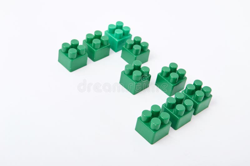 Figures from a colored cubes designer on a white background royalty free stock image