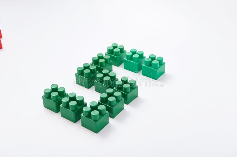 Figures from a colored cubes designer on a white background royalty free stock images