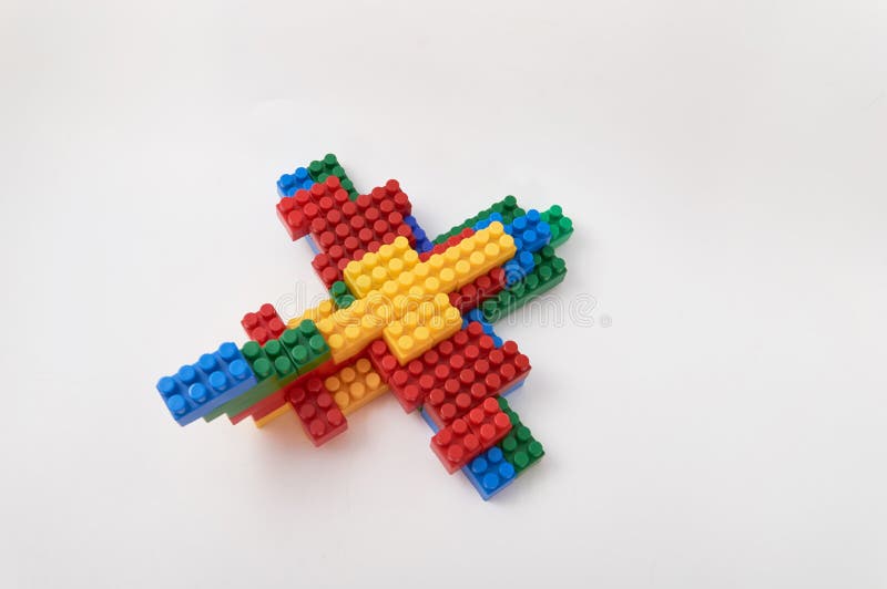 Figures from a colored cubes designer on a white background stock image