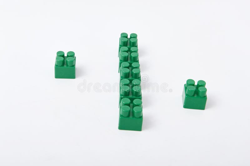 Figures from a colored cubes designer on a white background royalty free stock photos