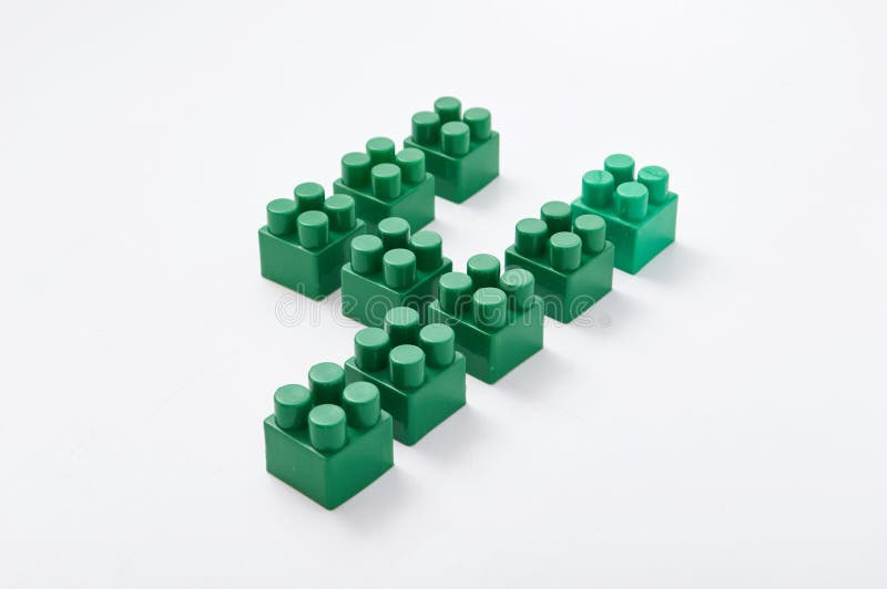 Figures from a colored cubes designer on a white background stock image