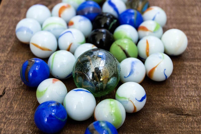 Children`s Games, Playing Marbles, Various Colored Marble Paintings