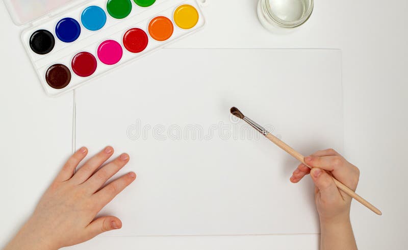 Kid Hands Painting at the Table with Art Supplies, Top View Stock Photo -  Image of childhood, child: 146297712