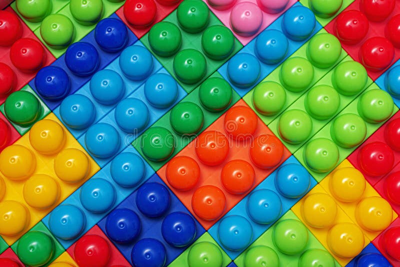 Children&#x27;s multi-colored constructor as an abstract background. Multicolored blocks close-up. stock photos