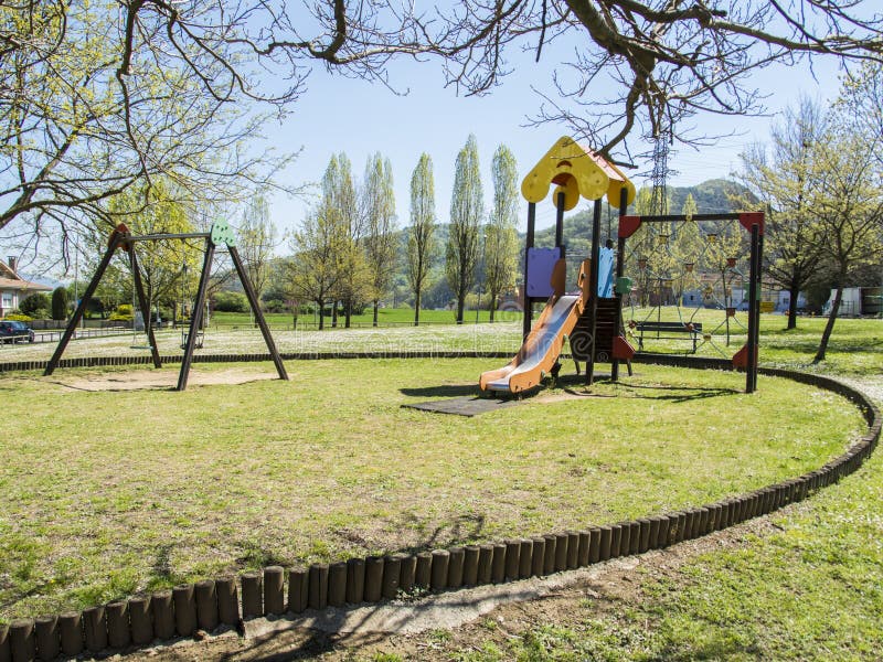 Children`s Playground With Swings And Slide Stock Image Image Of Park