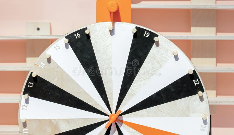 Children`s wooden roulette with numbers. Roulette wheel stock photography