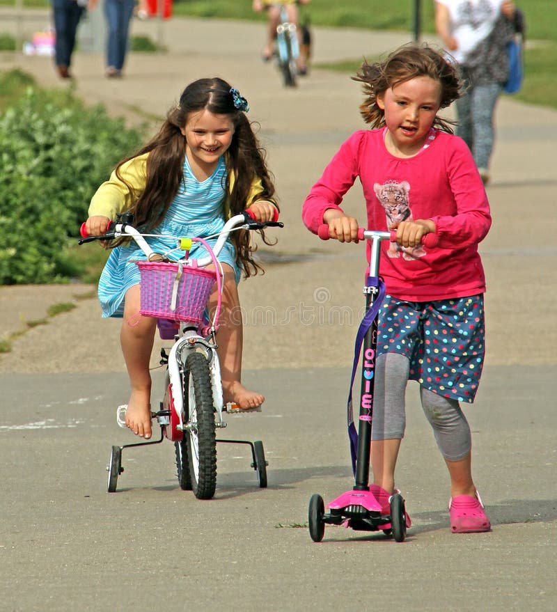 children on scooters