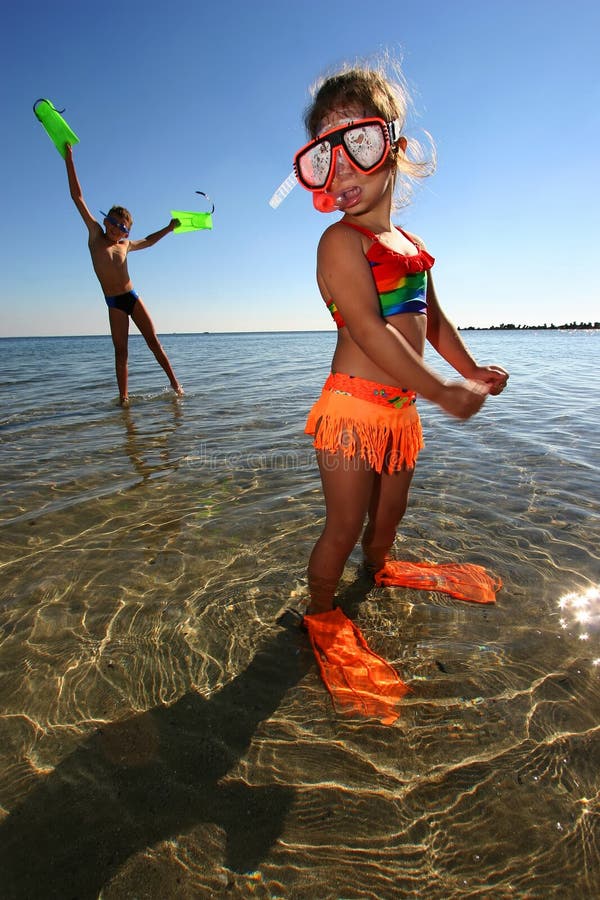 Children playing on sea. Children playing on sea