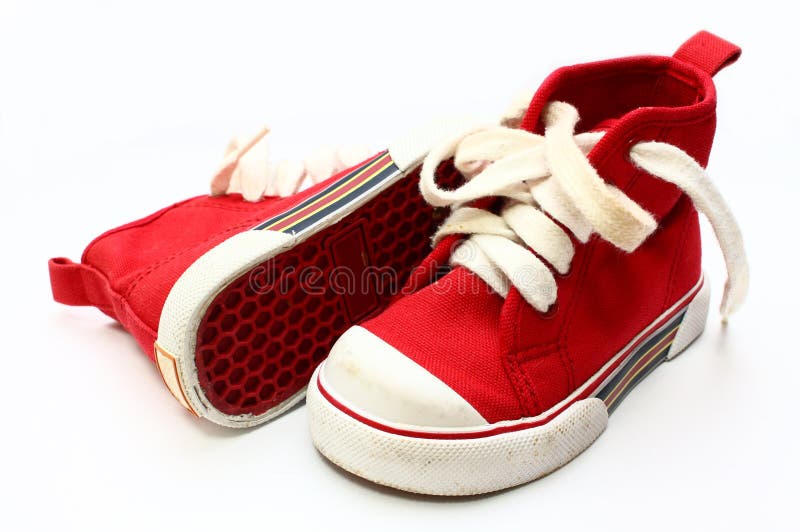 Bambini scarpe Rosse isolato su sfondo bianco.