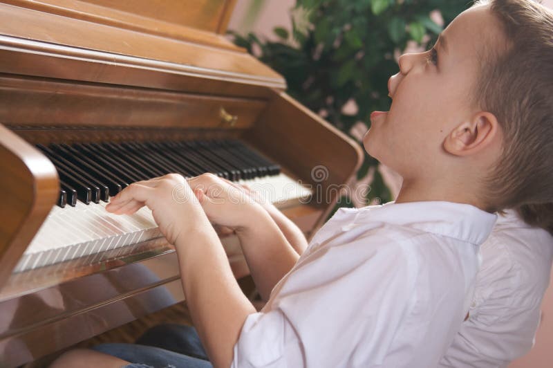 Children Singing & Playing the Piano