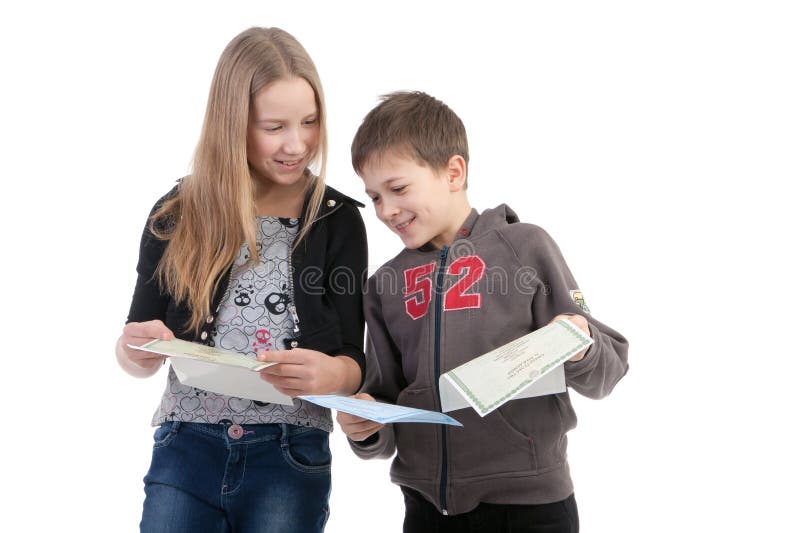 Children study the documents