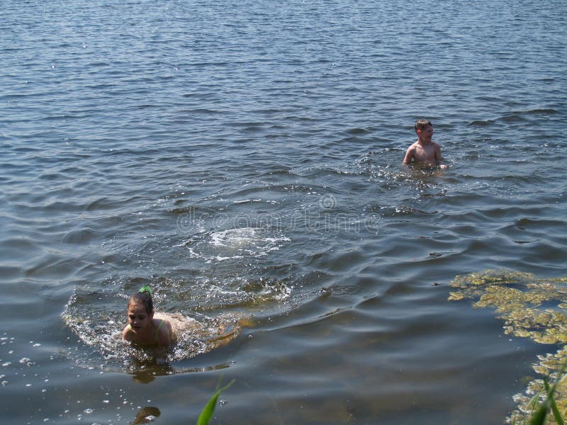 Children Bathe in the River Stock Photo Image of pour, kids 99242236
