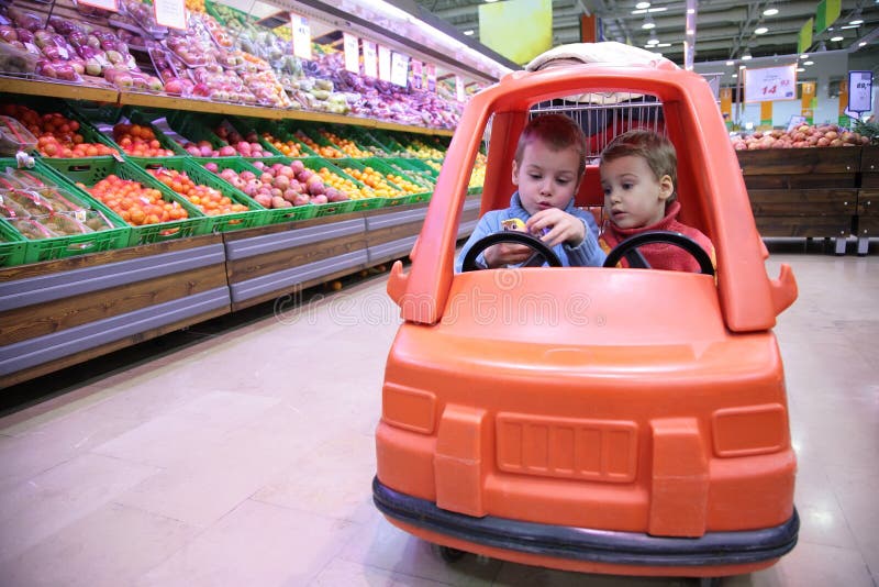 Children in toy automobile