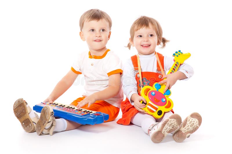 Children with toys in the studio