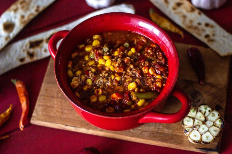Chile Con Carne and Ingredients for Him. Mexican Cuisine Stock Photo