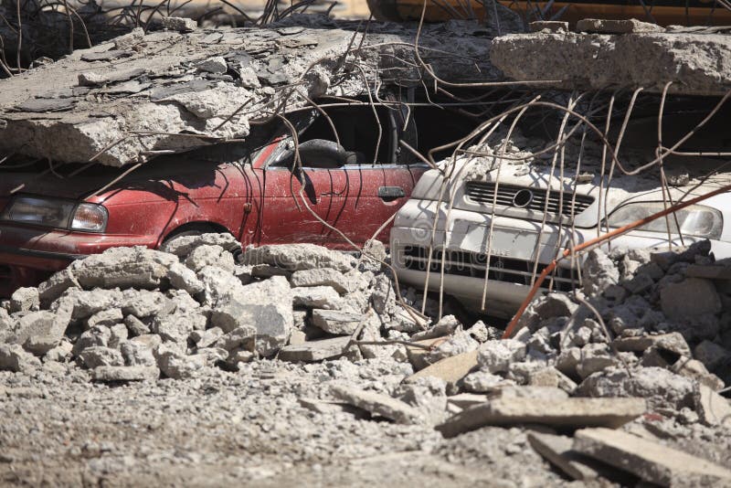 Cars in a parking crushed by the building floor, during the earthquake of February 27, 2010 in Santiago, Chile. Cars in a parking crushed by the building floor, during the earthquake of February 27, 2010 in Santiago, Chile.