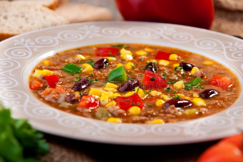 Chili Con Carne with Cheese in a Bowl Stock Photo Image of bowl, fork