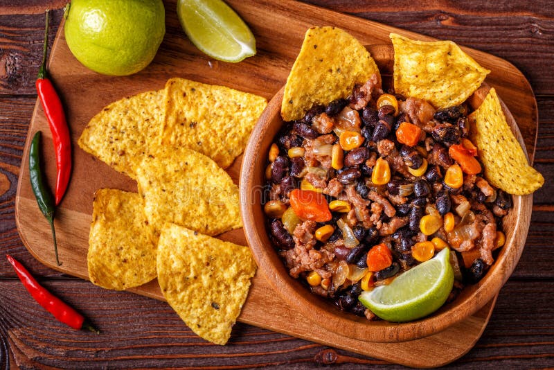 Chili Con Carne in Bowl with Tortilla Chips. Stock Image - Image of ...