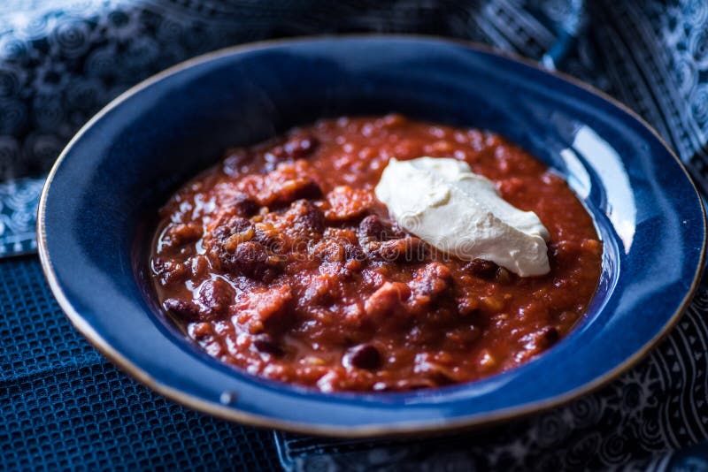 Chili Con Carne with Creme Fraiche Stock Photo - Image of meat ...