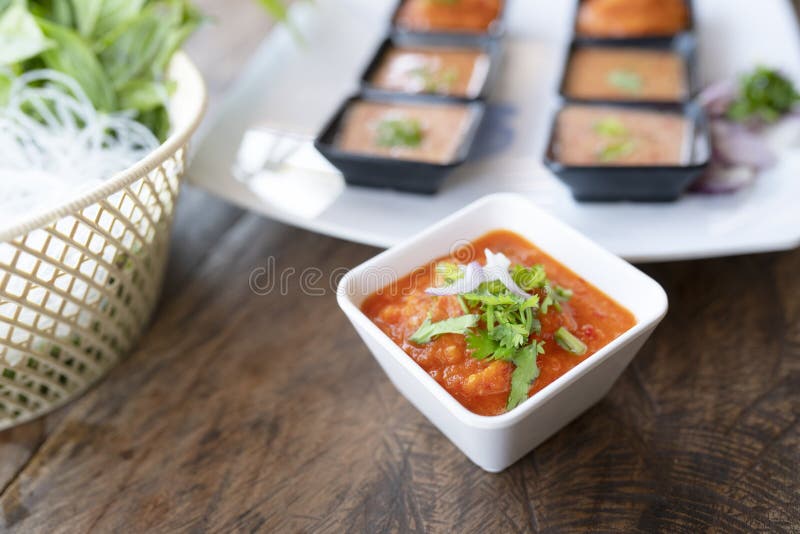 Chili sauce in white bowl stock photo Chili sauce in white bowl stock photo