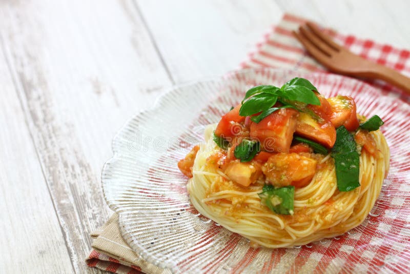 Chilled Capellini with Fresh Tomatoes and Basil Stock Image - Image of ...