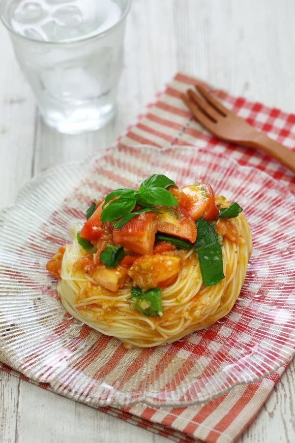 Chilled Capellini with Fresh Tomatoes and Basil Stock Photo Image of