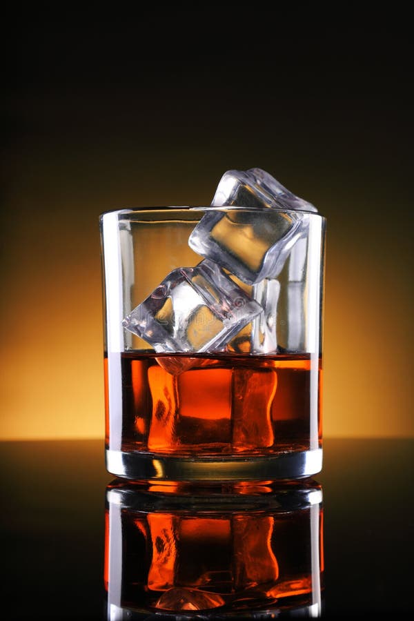 Chilled Whisky / Rum Glass with Ice Cubes Stock Photo Image of
