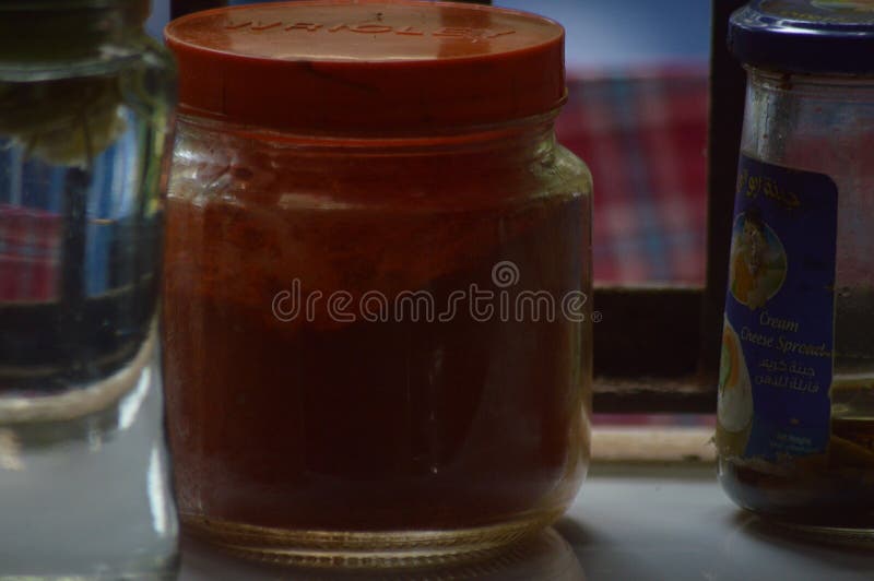 Chilli Powder on a Glass Bottle Stock Image Image of meal, plant
