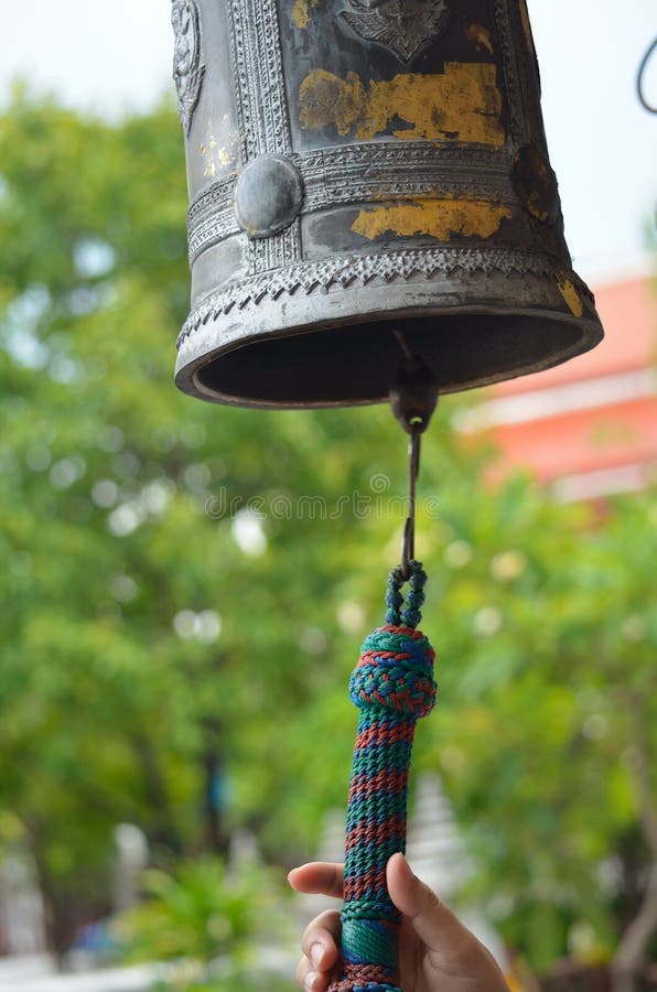 Chiming the bells stock photo. Image of toll, luck, chimes 45721232