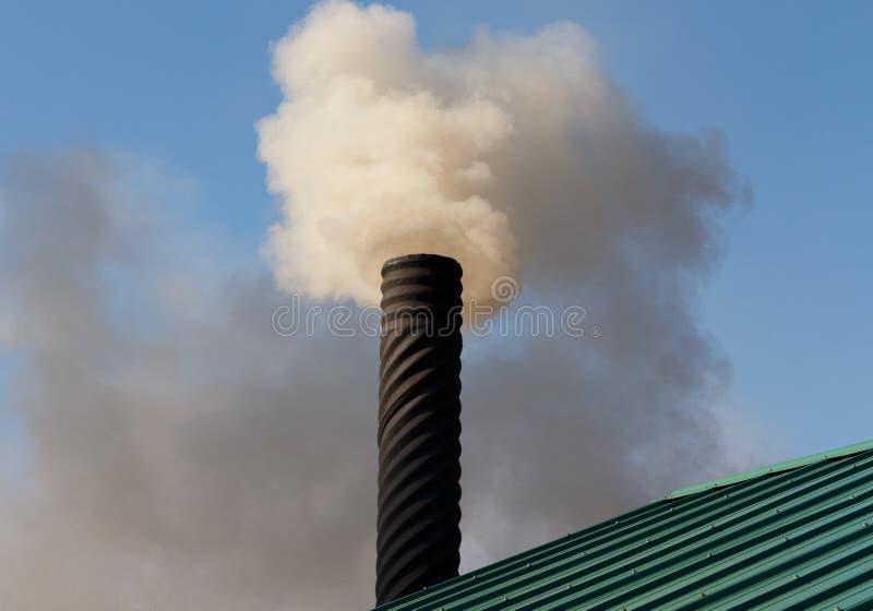 Chimney Smoke behind Standing Man · Free Stock Photo